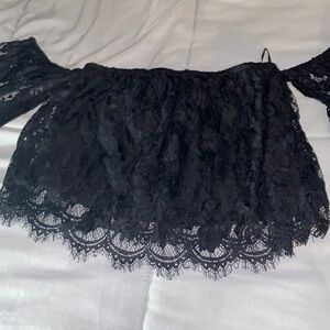Lace over the shoulder black top